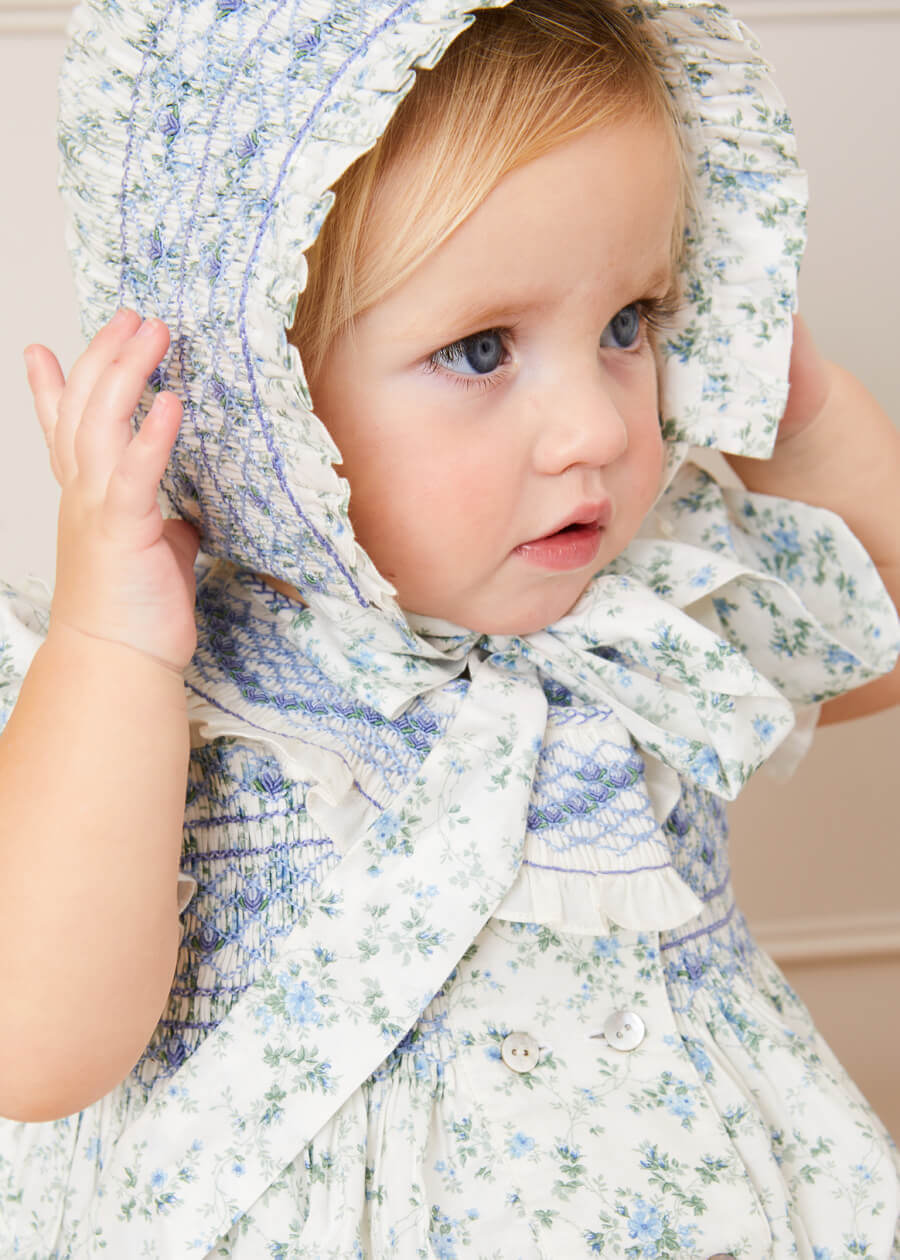 Floral Hand Smocked Bonnet in Blue Rompers from Pepa London US