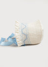 Off White and Blue Handsmocked Baby Bonnet Knitted Accessories  from Pepa London US