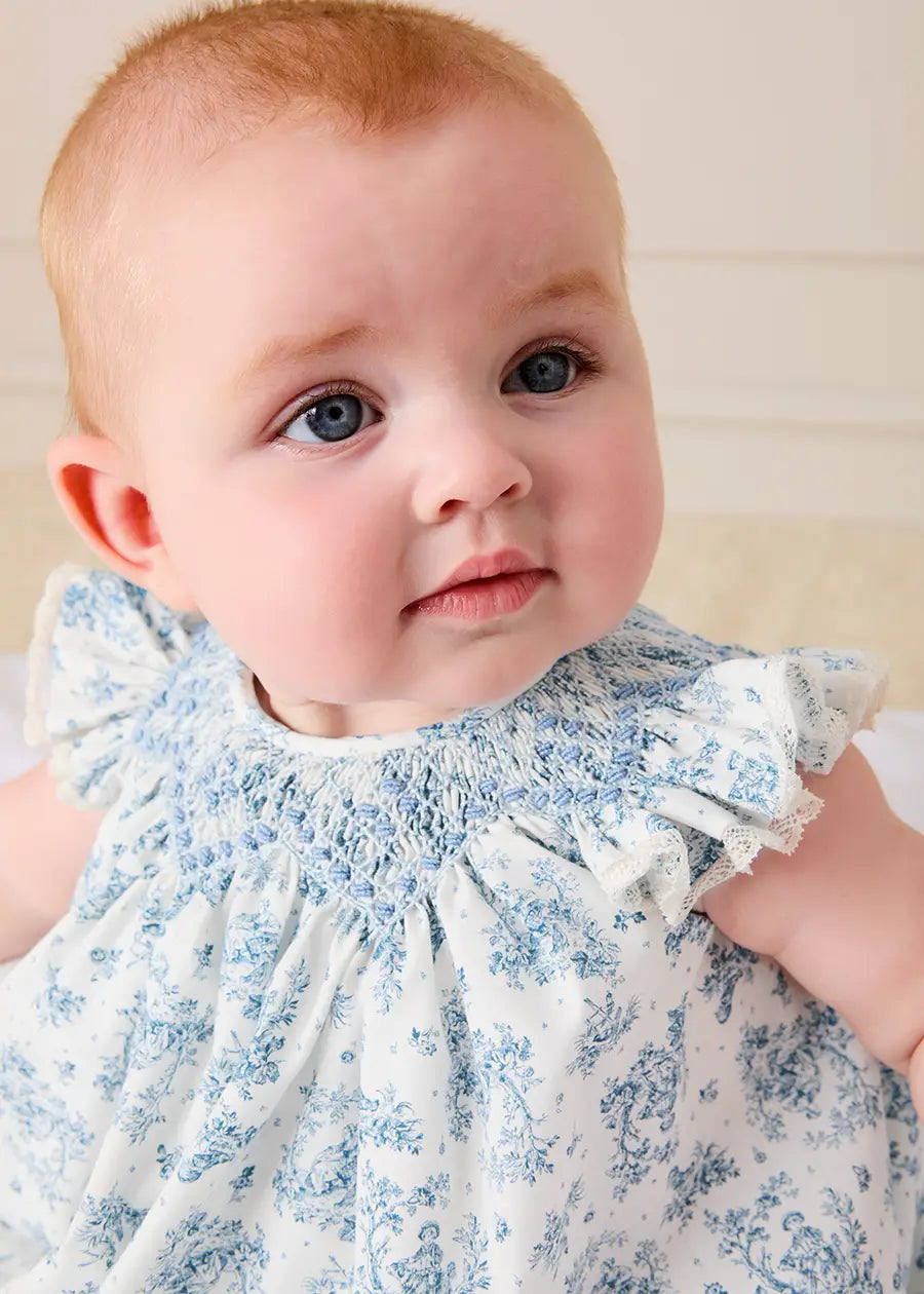Audrey Toile Capped Sleeve Hand Smocked Dress with Bloomers in Blue (3-12mths) Dresses from Pepa London