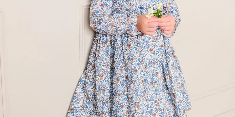 Beatrice Floral Hand Smocked Double Breasted Long Sleeve Dress in Blue (18mths-10yrs) Dresses from Pepa London US