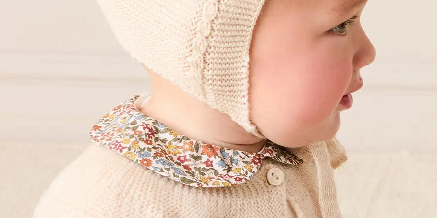 Openwork Cable Knit Bonnet in Cream (S-L) Bonnets from Pepa London US