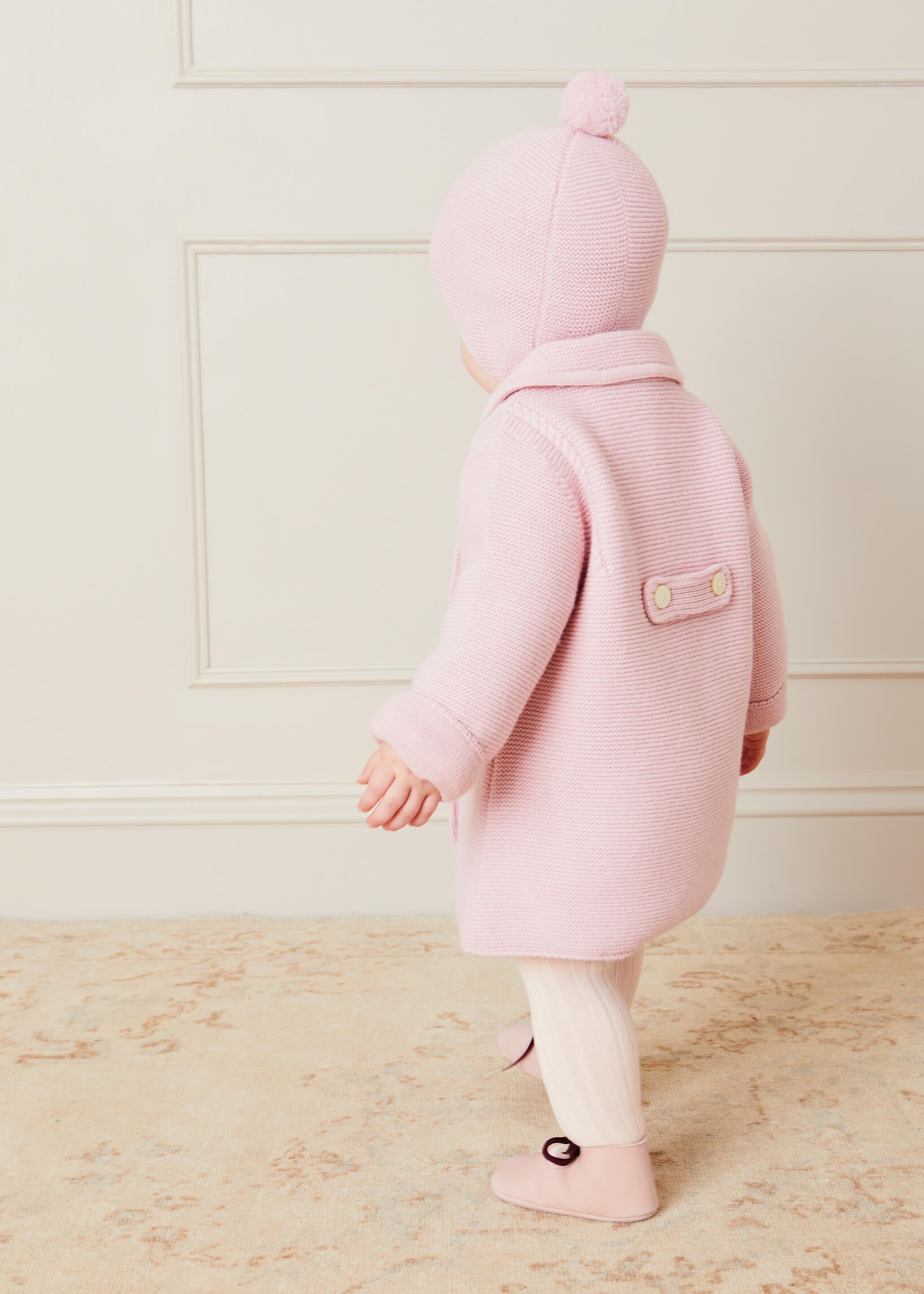 Merino Wool Pom Pom Hat In Pink (S-L) KNITTED ACCESSORIES from Pepa London US