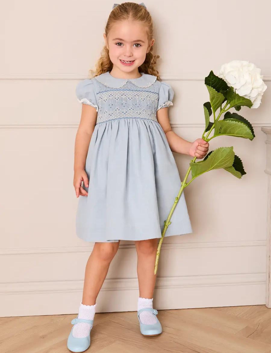Hand Smocked Peter Pan Collar Short Sleeve Dress in Sky Blue (12mths-10yrs) Dresses from Pepa London US