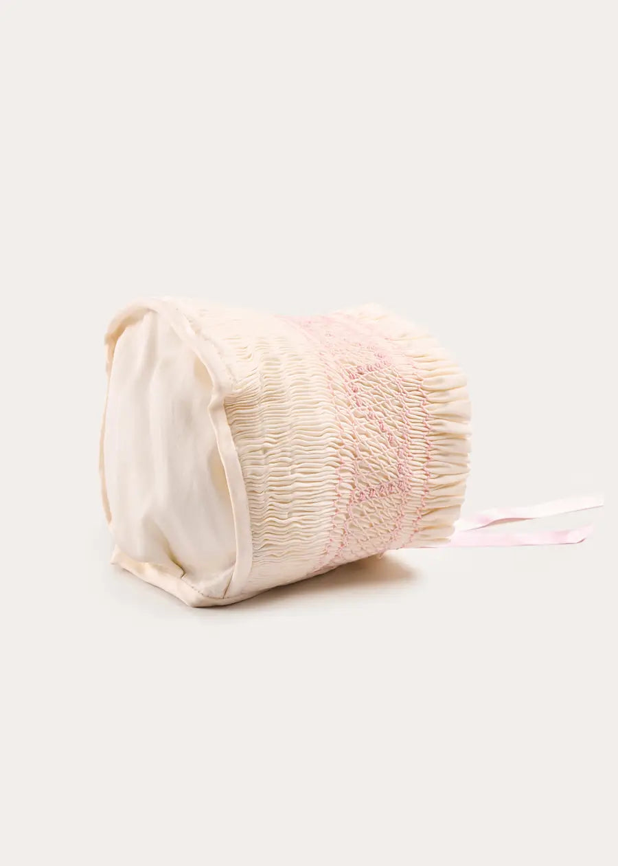 Off White and Pink Hand Smocked Baby Bonnet BONNETS from Pepa London US