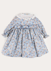 Beatrice Floral Hand Smocked Double Breasted Long Sleeve Dress in Blue (18mths-10yrs) Dresses from Pepa London US
