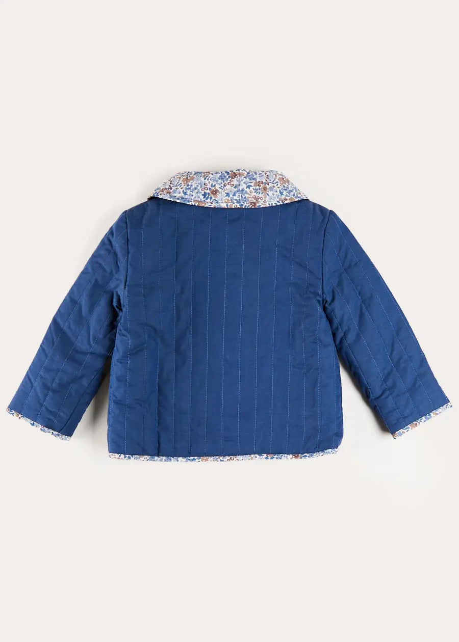 Beatrice Floral Reversible Quilted Jacket in Blue (3-10yrs) Coats from Pepa London US