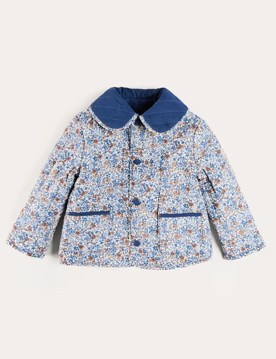 Beatrice Floral Reversible Quilted Jacket in Blue (3-10yrs) Coats from Pepa London US