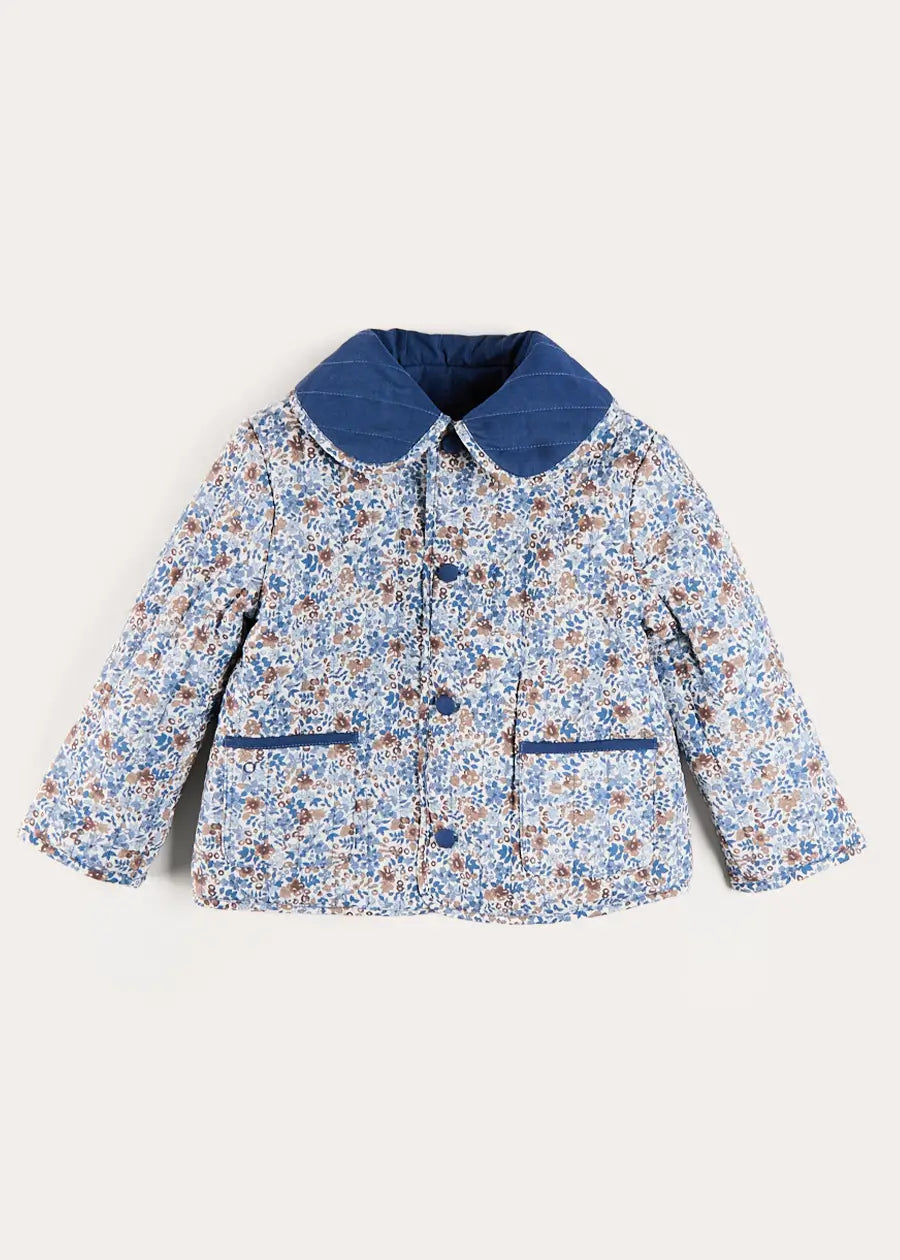 Beatrice Floral Reversible Quilted Jacket in Blue (3-10yrs) Coats from Pepa London US