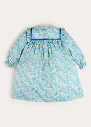 Leontyne Floral Bow Detail Long Sleeve Trapeze Dress in Blue Made with Liberty Fabric (18mths- 10yrs) Dresses from Pepa London US