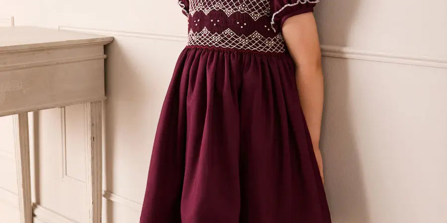 Hand Smocked Peter Pan Collar Short Sleeve Dress in Burgundy (12mths-10yrs) Dresses from Pepa London US