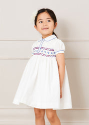 Hand Smocked Plumetti Short Sleeve Dress in White (12mths-6yrs) Dresses from Pepa London US