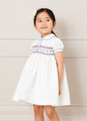 Hand Smocked Plumetti Short Sleeve Dress in White (12mths-6yrs) Dresses  from Pepa London US