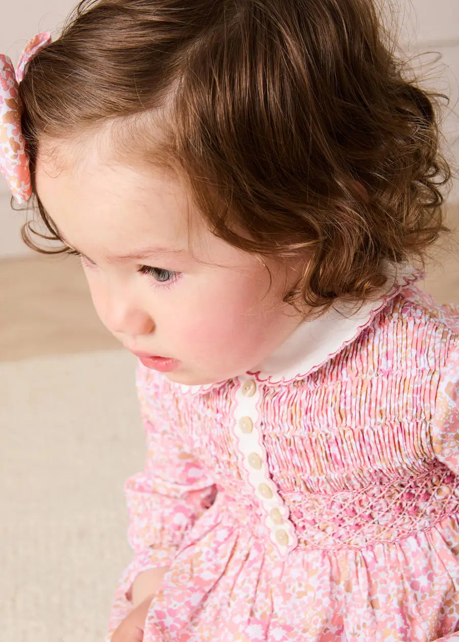Nellie Floral Hand Smocked Long Sleeve Romper in Pink (6mths-2yrs) Rompers from Pepa London US
