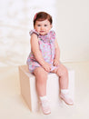 Floral Print Handsmocked Romper in Pink (3-18mths) - Rompers - PEPA AND CO vimeo_692222933