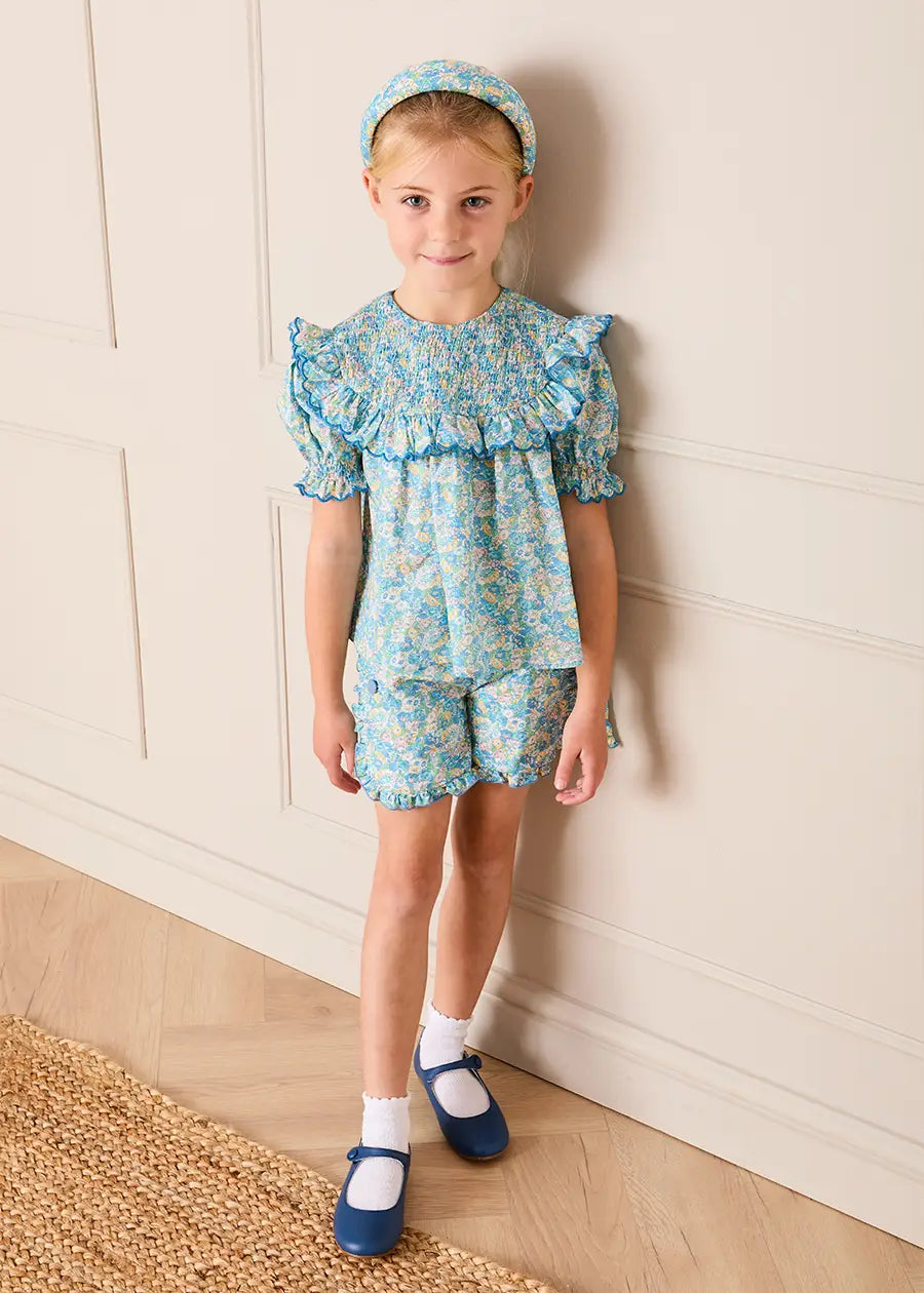 Leontyne Floral Scalloped Smocked Detail Short Sleeve Blouse in Blue Made with Liberty Fabric (2- 10yrs) Blouses from Pepa London US