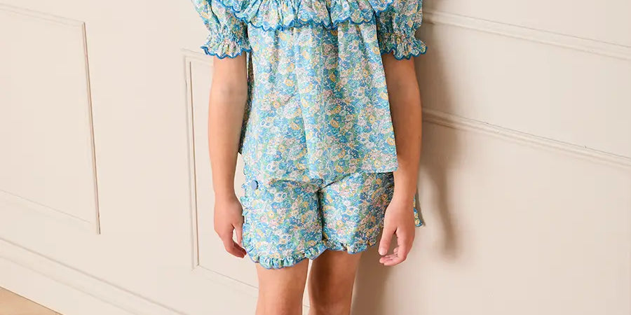 Leontyne Floral Scalloped Smocked Detail Short Sleeve Blouse in Blue Made with Liberty Fabric (2- 10yrs) Blouses from Pepa London US