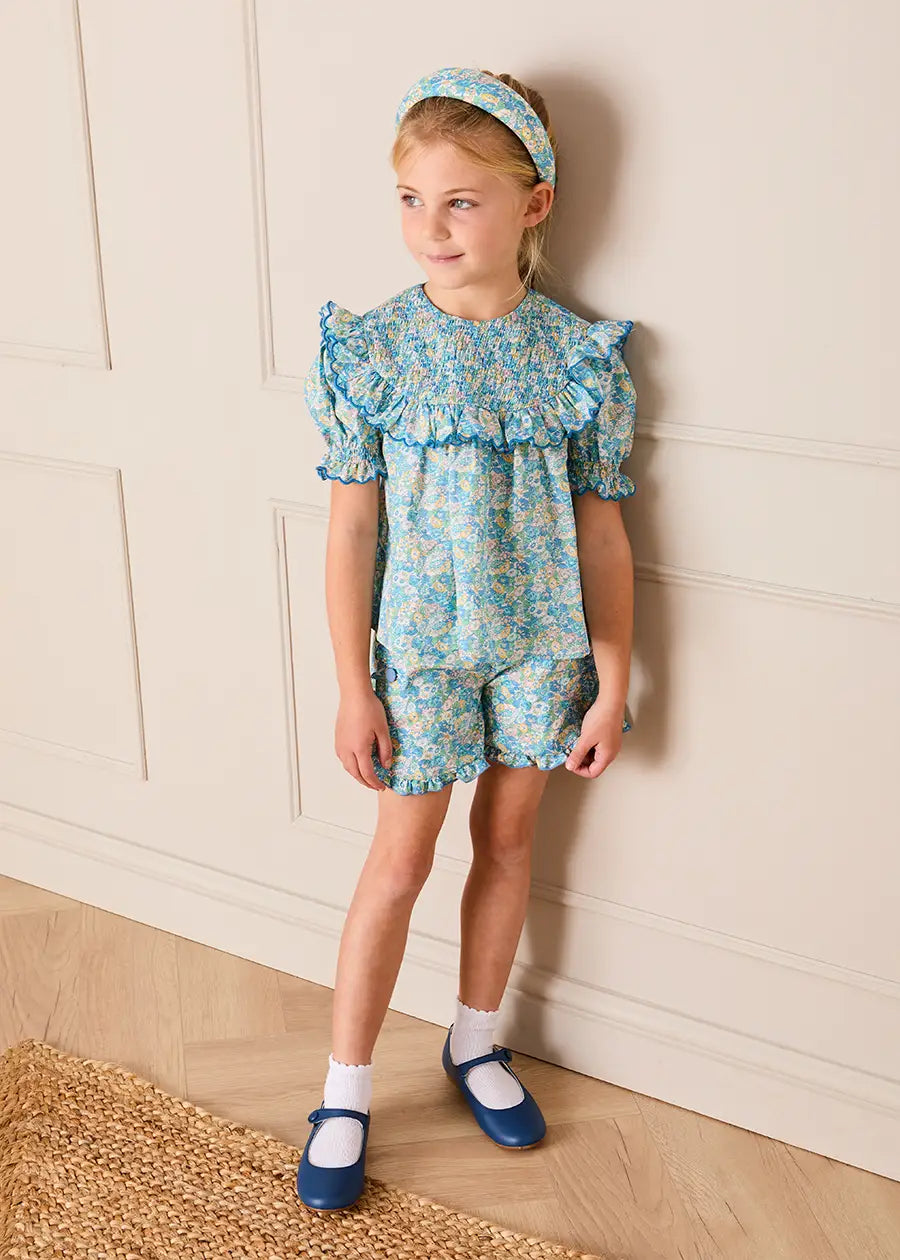 Leontyne Floral Scalloped Smocked Detail Short Sleeve Blouse in Blue Made with Liberty Fabric (2- 10yrs) Blouses from Pepa London US