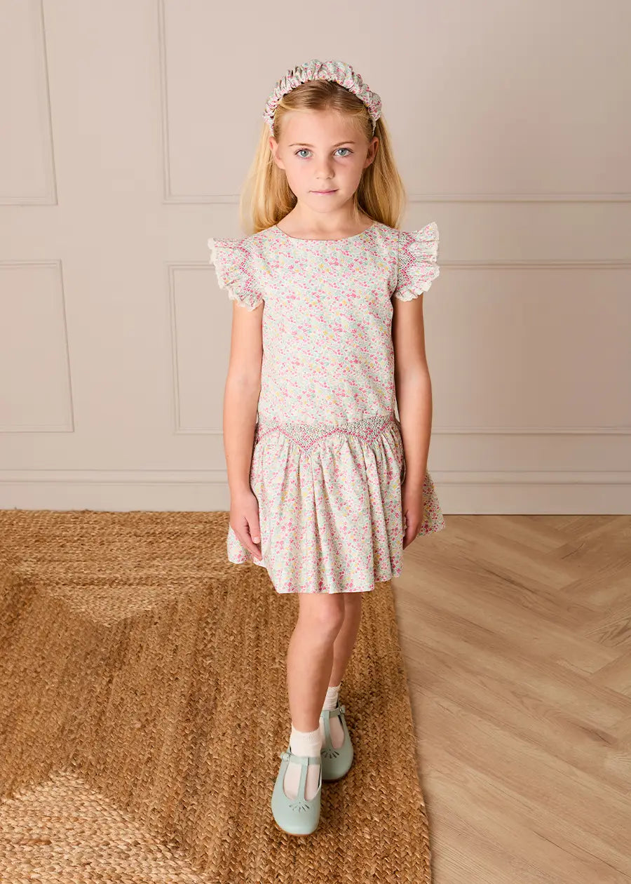 Adelaide Floral Smocked Cap Sleeve Drop Waist Dress in Pink (4-12yrs) Dresses from Pepa London