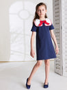 Statement Collar Cotton Dress in Navy (2-8yrs) - Dresses - PEPA AND CO vimeo_692218880