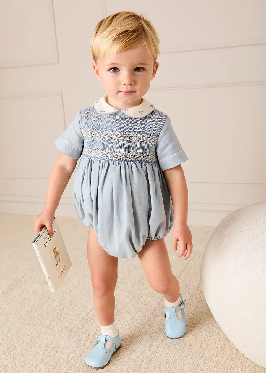 Hand Smocked Peter Pan Collar Short Sleeve Romper in Sky Blue (3mths-2yrs) Rompers from Pepa London US