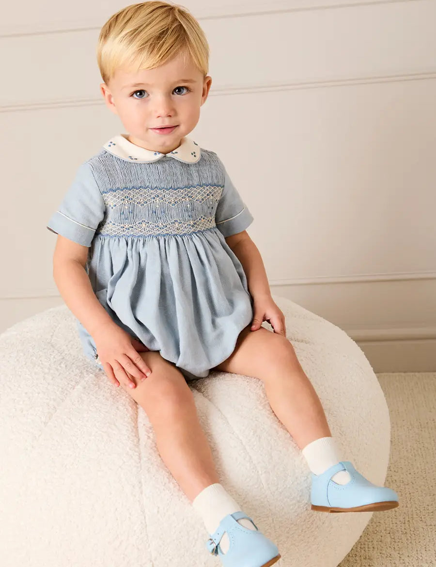 Hand Smocked Peter Pan Collar Short Sleeve Romper in Sky Blue (3mths-2yrs) Rompers from Pepa London US