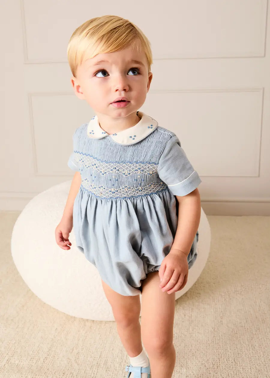 Hand Smocked Peter Pan Collar Short Sleeve Romper in Sky Blue (3mths-2yrs) Rompers from Pepa London US