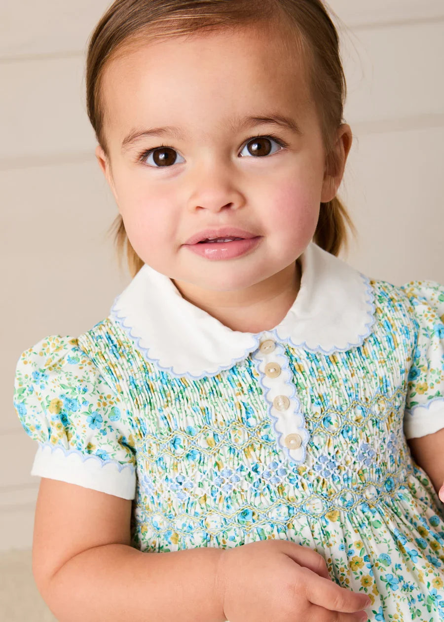 Louisa Floral Hand Smocked Short Sleeve Romper in Blue (3mths-2yrs) Rompers from Pepa London