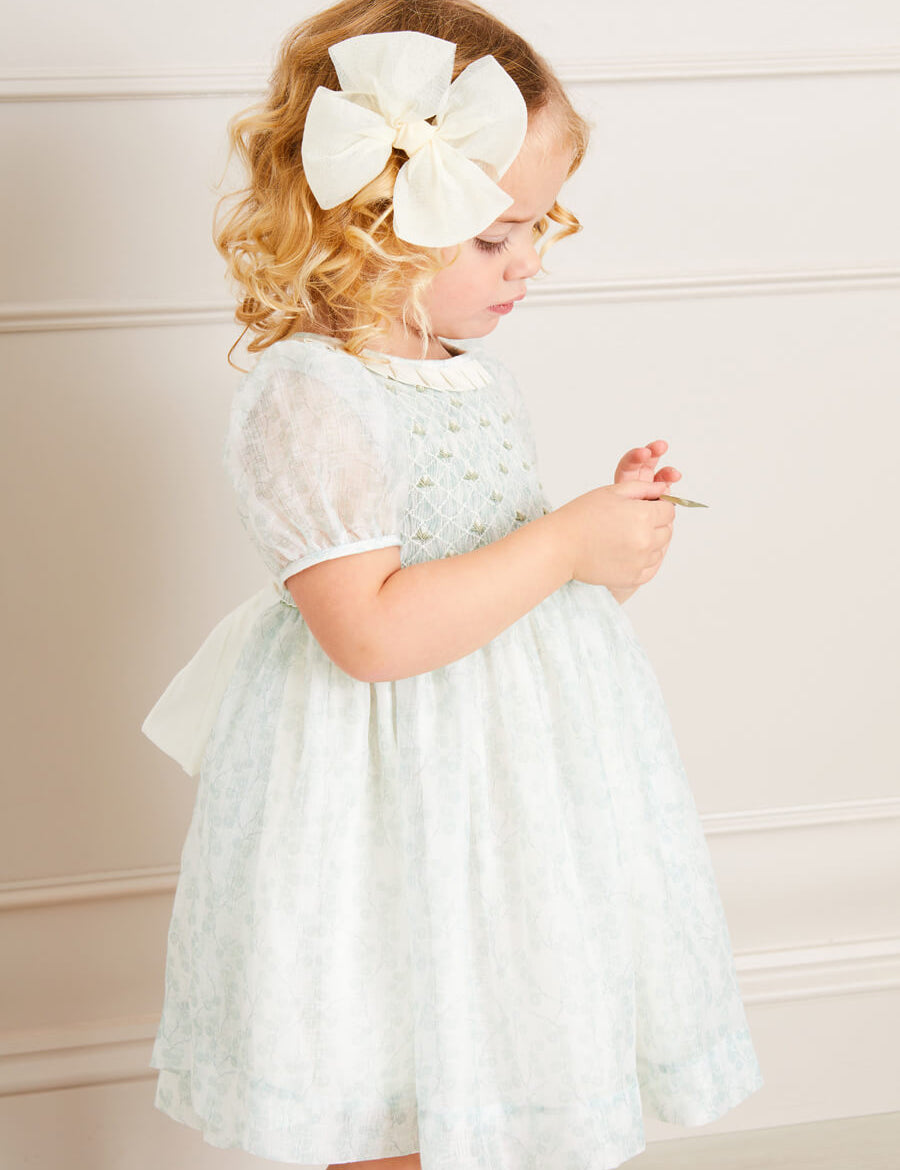 Constance Floral Print Hand Smocked Short Sleeve Party Dress in Light Green (12m-10yrs) Dresses from Pepa London