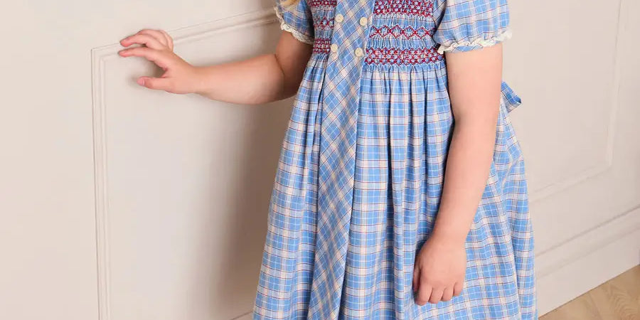Denby Check Hand Smocked Double Breasted Short Sleeve Dress in Blue (12mths-10yrs) Dresses from Pepa London US