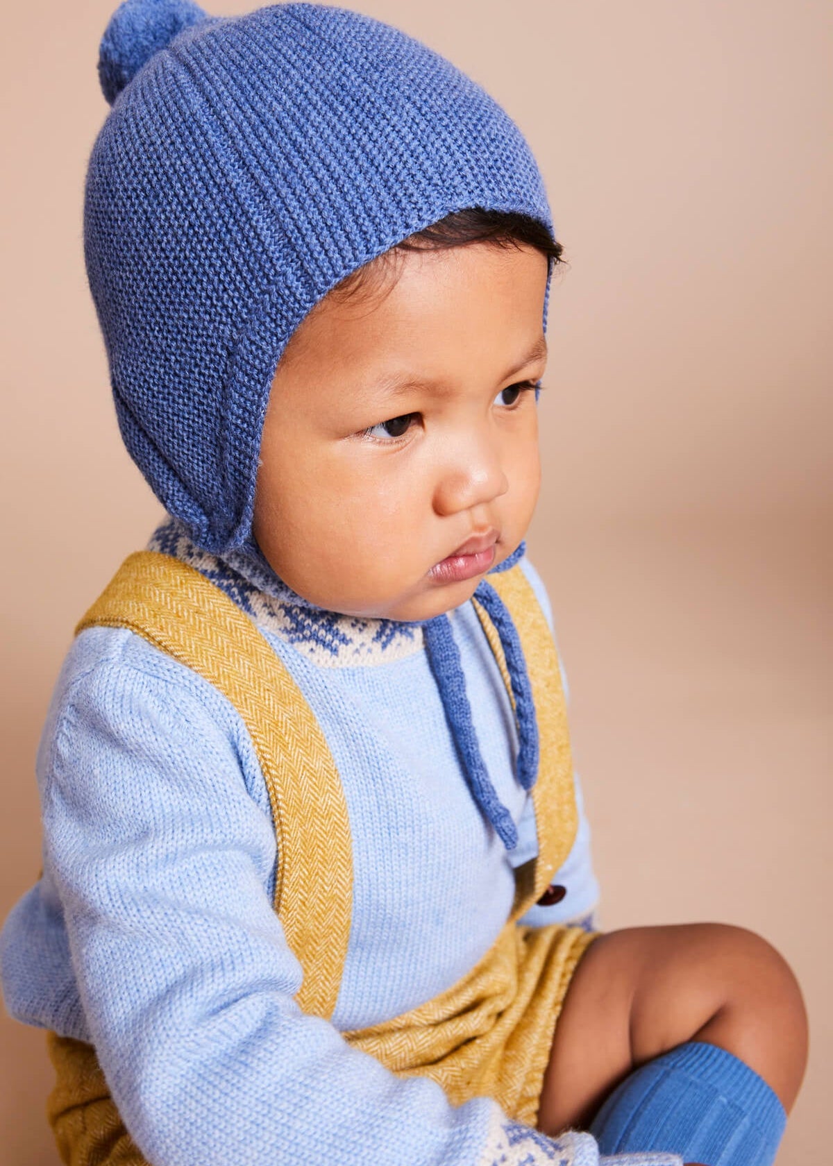 Knitted Merino Wool Winter Bonnet in Blue (S-L) Knitted Accessories  from Pepa London US