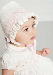 Off White and Pink Hand Smocked Baby Bonnet KNITTED ACCESSORIES from Pepa London US