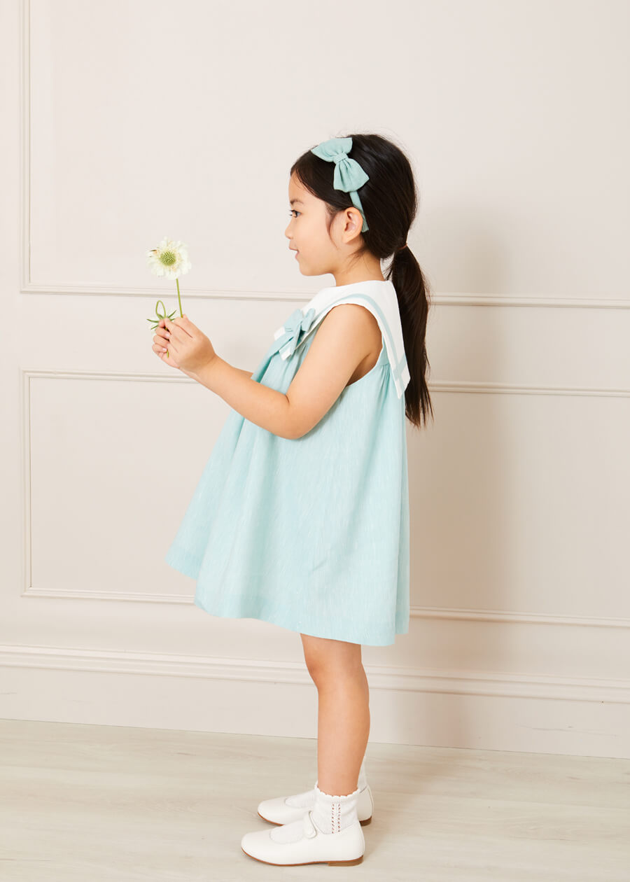 Sleeveless Trapeze Dress With Bow Detail in Green (12mths-10yrs) Dresses from Pepa London US