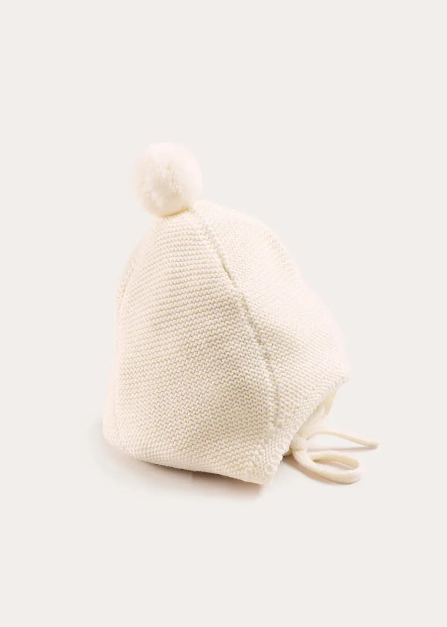 Merino Wool Pom Pom Hat in Cream (S-L) Knitted Accessories from Pepa London US