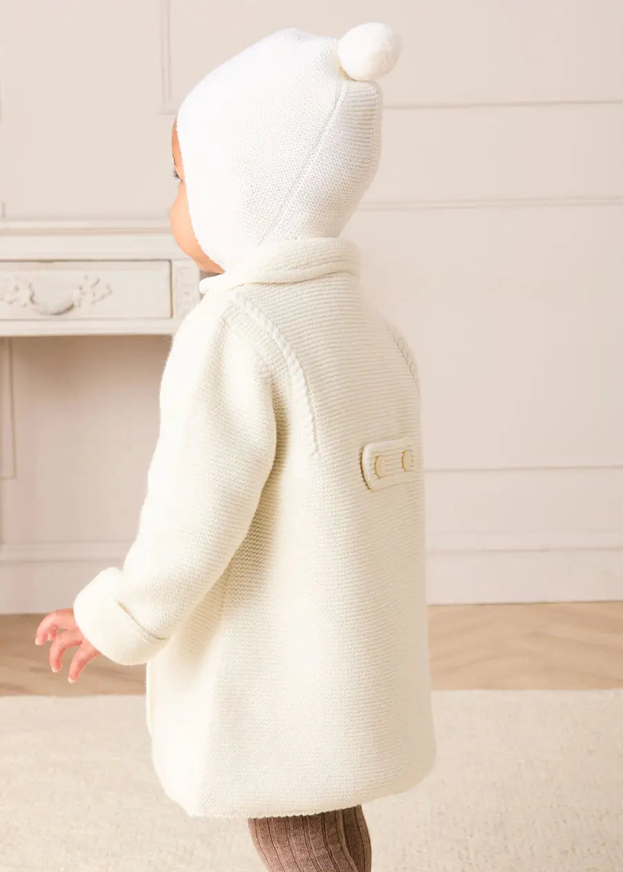Merino Wool Pom Pom Hat in Cream (S-L) Knitted Accessories from Pepa London US