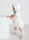 Off White and Blue Handsmocked Baby Bonnet Knitted Accessories  from Pepa London US
