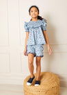 Daphne Floral Print Smock Detail Short Sleeve Blouse in Blue (2-10yrs) Blouses  from Pepa London US